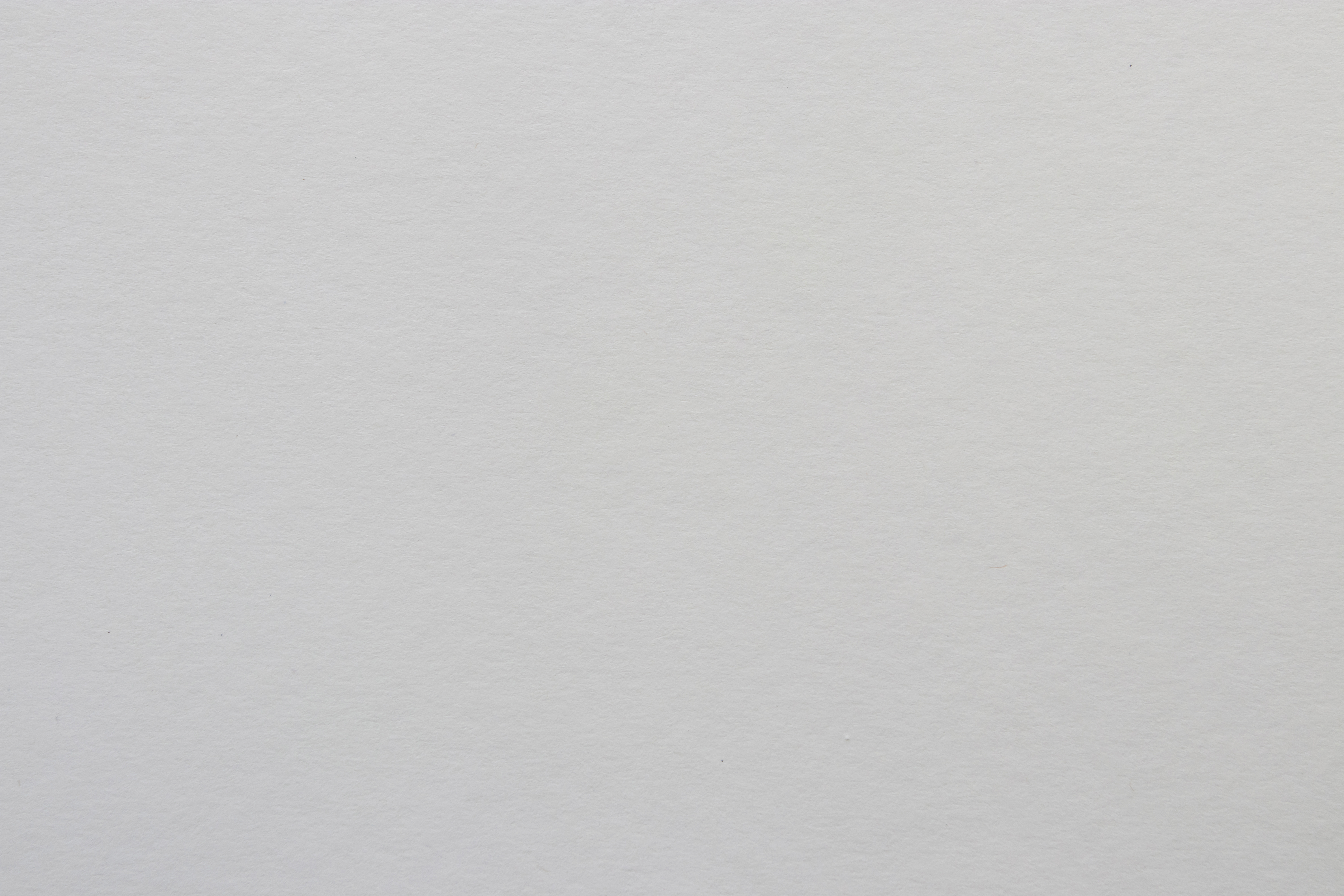 Light gray colored tinted paper sheet background.